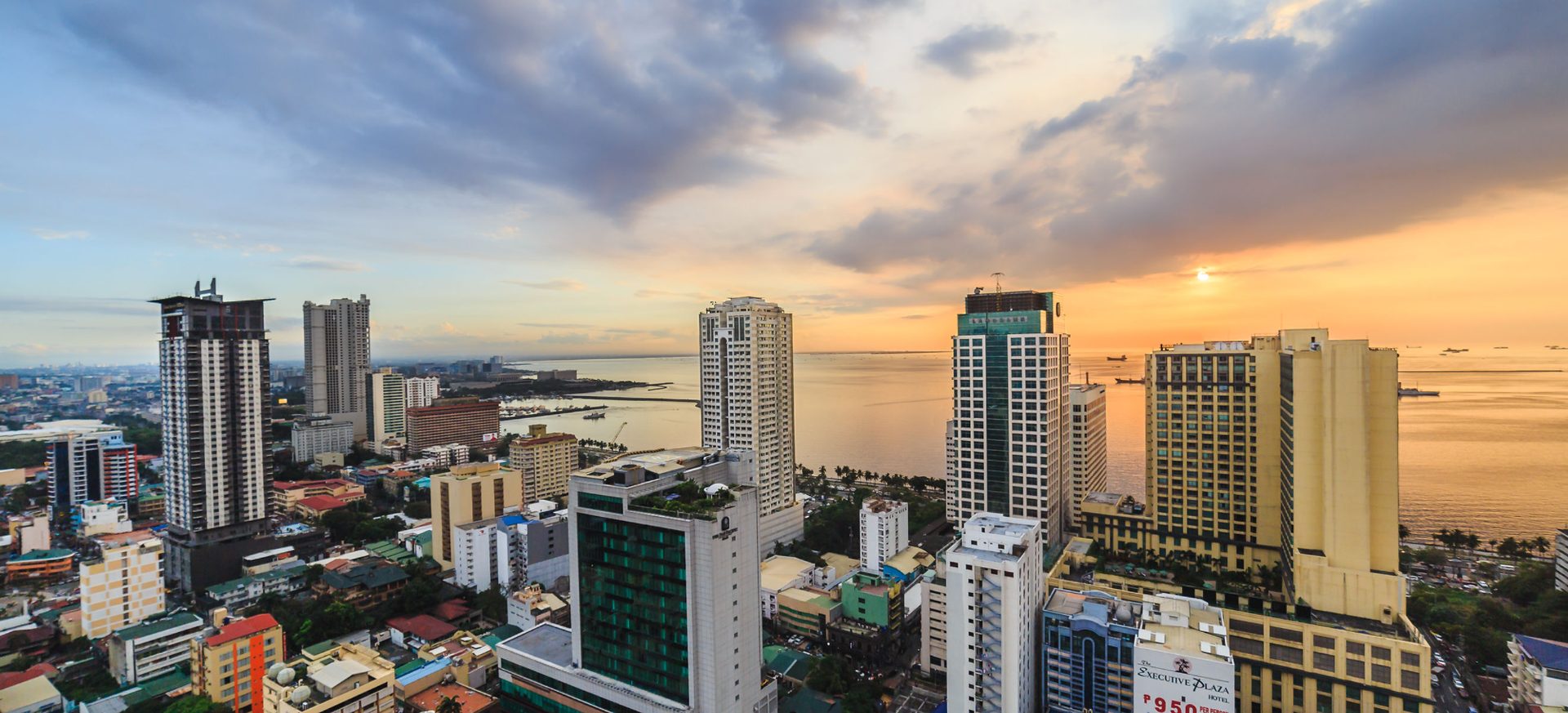 Manila Bay at dusk from Regency Grand Suites